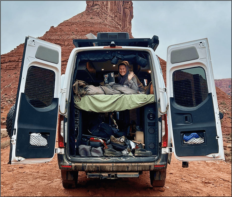 Some Observable team members in a camping van.